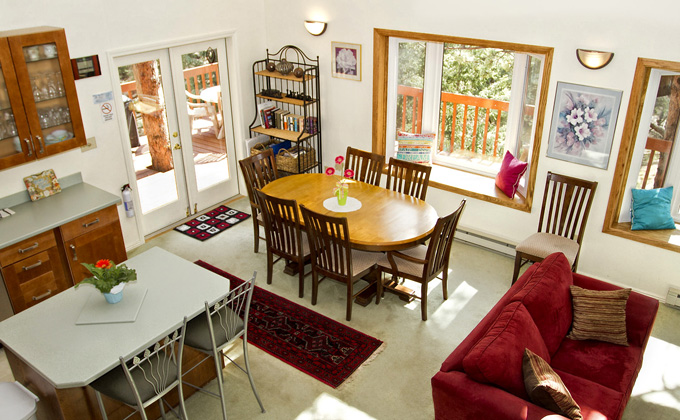 Expandable dining room table with a view